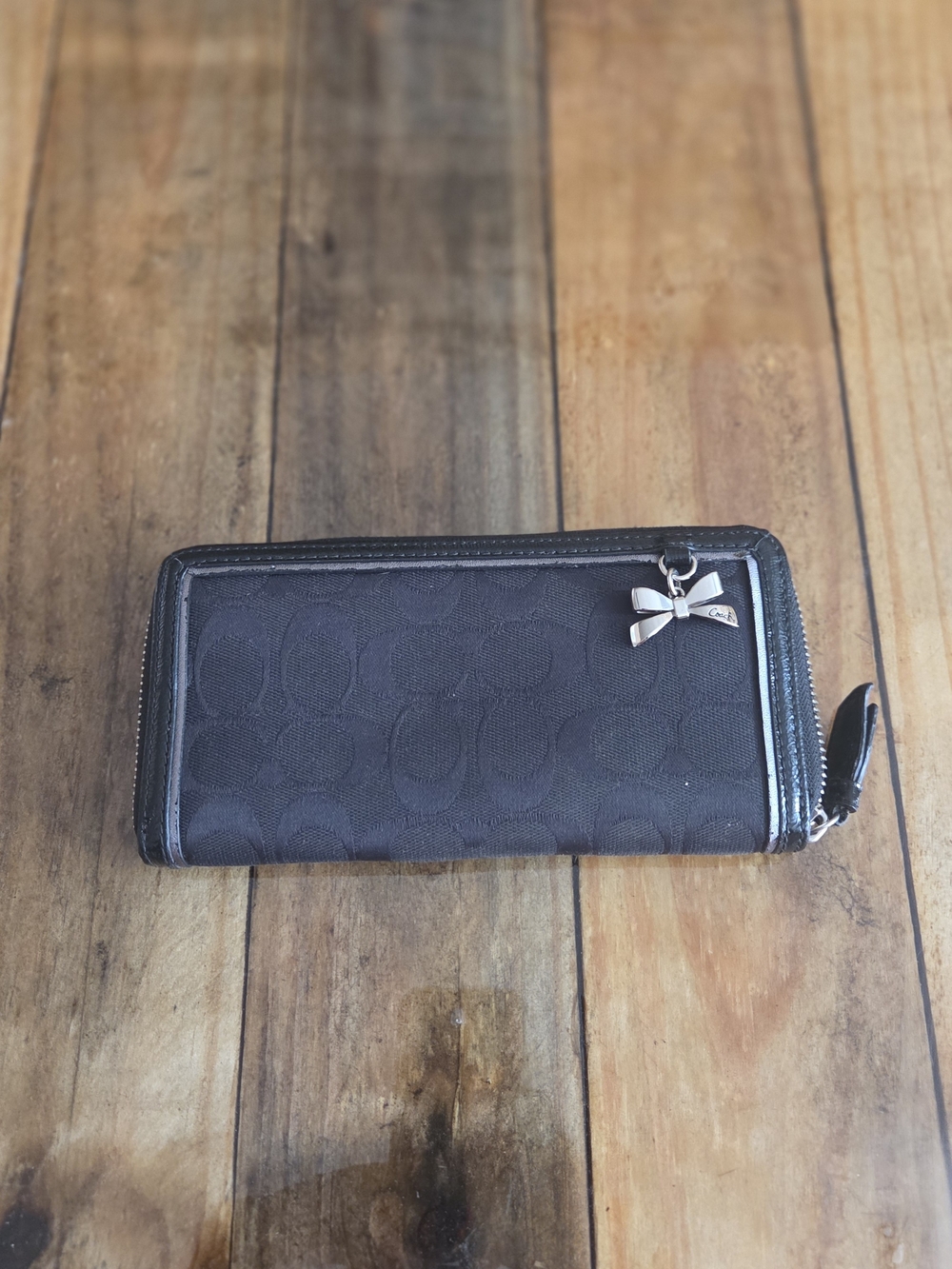Coach Black Signature Zip-Around Wallet with Bow Charm